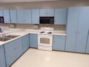 lot 45 image: 8 x 11 Kitchenette with sink, NO STOVE, and Microwave with counter and cabinets
