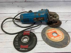 lot 13 image: Ryobi Angle Grinder with Disks