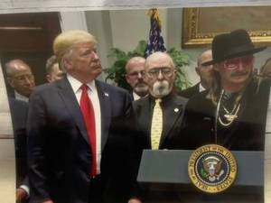 lot 58 image: Donald Trump with Kid Rock 8x10