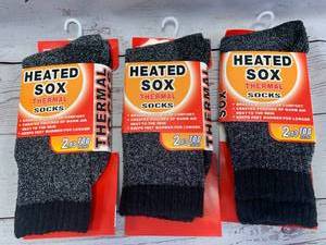 lot 93 image: 3 Pair of Thermal Winter Socks $44.95 retail