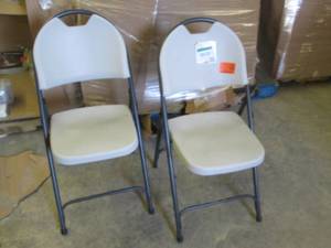 2 HDX Resin Folding Chairs...