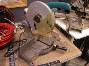 lot 142 image: Makita Miter Saw