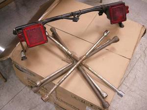 lot 201 image: Tire Irons and Light Bar