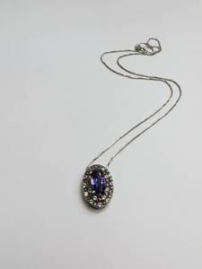 lot 12 image: Sterling Silver Necklace with Purple Pendant