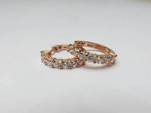 lot 13 image: 18K Rose Gold over Sterling Silver Huggie Earrings