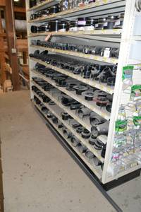 lot 2855 image: Huge Inventory of Black ABS Pipe Fittings 1-12 to 4