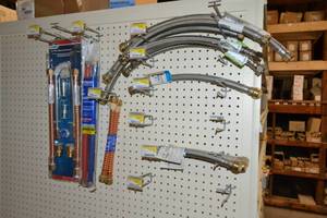 lot 2863 image: Gas Water Heater Connector Kits, Sharkbite Flexible Stainless Steel Hoses and More