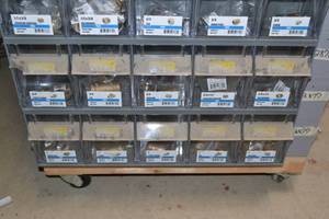 lot 2892 image: (2) Tip Out Storage Racks w Brass Pipe Fittings Inventory 1 to 34