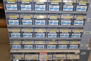 lot 2885 image: (3) Tip Out Storage Racks w Brass Pipe Nipples Inventory 34 to 14