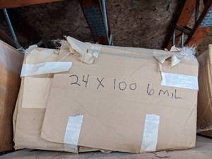 lot 2941 image: Husky Black Polyethelene Sheeting 24 x 100 - 6 MIL