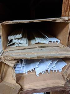 lot 2948 image: Lot of 16 and 6 Garage Door Trim Seals - White
