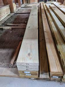 lot 3033 image: (11) 2x8 and 2x4 Treated Lumber
