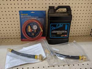 lot 3128 image: Air Tank Conversion Kit, Adapter Hoses to Winterize RVs and Sprinkler Systems and 1 Gallon Sta-Lube Compressor Oil