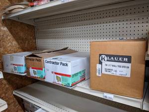 lot 2544 image: (4) Boxes of 2x10 or 2x12 Joist Hangers  78 x 7 Wall Ties