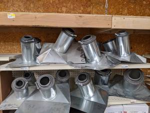 lot 2546 image: (14) Assorted FJ Moore Roof Pipe Flanges 2 to 4 Sizes