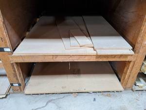 lot 2721 image: (2) 4 x 8 x 34 Sheets of Particle Board  Smaller Pieces