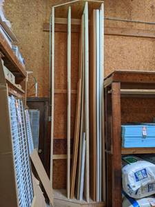 lot 2767 image: (5) 12 x 23 (2) 12 x 15-12 White and Wood Colored Shelving  (16) Shorter Pieces