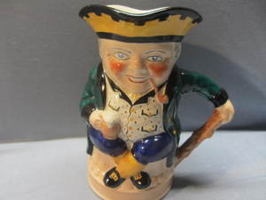 lot 101 image: Bishop Toby Style Pitcher