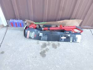 Craftsman 24 volt weed trimer with battery & charger. Nearly new. Tested & works. As shown.