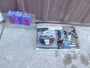 Flat of wrenches.stapler & drain auger. As shown.