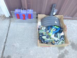Flat of hose hanger & assorted garden hose connectors. As shown.
