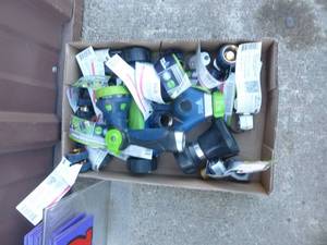 Flat of assorted garden hose sprayers & connectors. As shown.