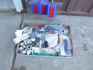 Flat of assorted hose ends & 12 volt adapters. As shown.
