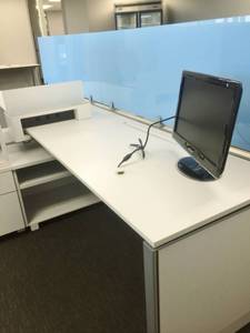 lot 25 image: WOW MRSP $9800&nbspHIGH QUALITY STEELCASE UNIVERSAL WHITE&nbspHIGH PRESSURE LAMINATE DOUBLE (2) WORKSTATION DESKS WITH FULL WIRING AND CABLE MANAGEMENT SYSTEM WITH UPDATE - BOTH BLUE GLASS PANELS ARE PRESENT NOW 