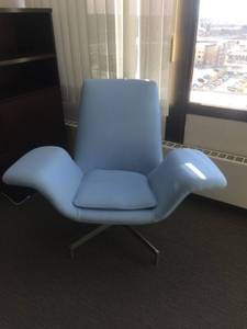 lot 26 image: WOWOW MSRP $4000 HBF DIALOGUE WINGED MID CENTURY MODERN MCM INSPIRED LOUNGE CHAIR WTASK SURFACE ON ARM & SELF RETURN BASE IN SATIN PEWTER FINISH  SOFT POWDER BLUE - GREAT CONDITION -MINOR WEAR 