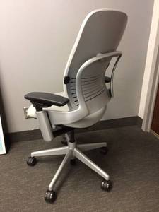 lot 33 image: MSRP $1000 High Quality Steelcase Leap LiveBack Natural Glide System Technology Multifunctional Ergonomic Special High Back Executive Office Chair 400lb Capacity - Please See YouTube - Cream Color UPDATE - COLOR IS MORE PALE GREY - Excellent Condition