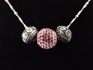 lot 7 image: .925 Sterling Silver Pink Crystal Charm Necklace