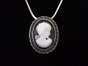 lot 14 image: .925 Sterling Silver Black Onyx and Ivory Cameo Pendant Necklace