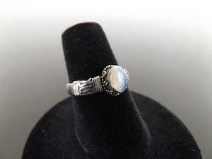 lot 53 image: .925 Sterling Silver Opal Cabochon Celtic Knot Ring Size 6