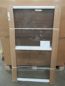 lot 260 image: Weatherstar 28 in. x 47 in. 3-Track Storm Aluminum Window in White, C3032847