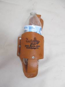lot 10 image: Leather pop bottle holder