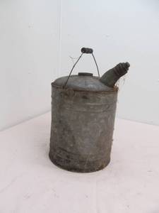 lot 77 image: vintage oil can