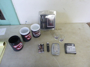 lot 74 image: Dale Earnhardt Sr. Beer Koozies and Shot Glasses