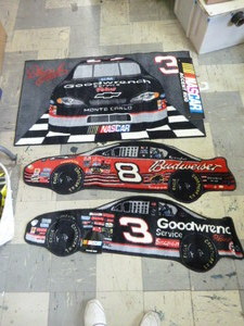 lot 77 image: Dale Earnhardt Sr. and Jr. Rugs