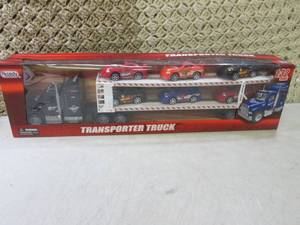 lot 37 image: Transporter Truck with 6 Cars 132 ...