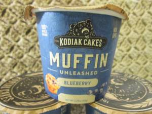 lot 215 image: 10 Kodiak Cakes Blueberry Muffin Un...