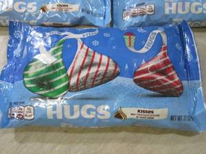 lot 230 image: 3 Bags of Hersheys Hugs Best by Aug...
