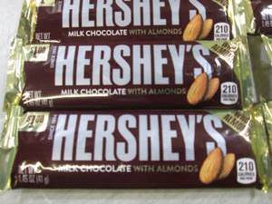 lot 238 image: 12 Hersheys with Almonds Candy Bars...