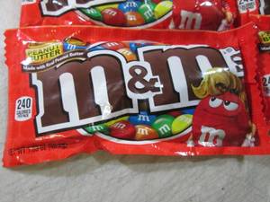 lot 240 image: 12 Bags of Peanut Butter M&Ms Best...