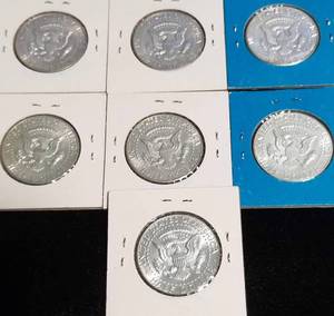 GROUP OF 7 AU-UNC 40% SILVER KENNEDY HALF DOLLARS