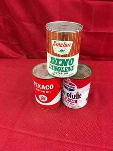 lot 104 image: Three Oil Cans