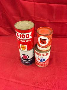 lot 105 image: Four Oil Cans
