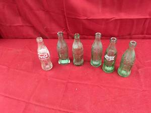 lot 121 image: 6 Misc Coke Bottles