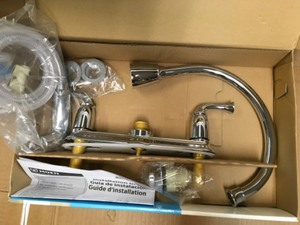 lot 53 image: MOEN Banbury 2-Handle Side Sprayer Kitchen Faucet in Chrome