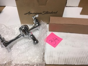 lot 34 image: American STD Commercial 6 in. to 10 in. Widespread 2-Handle Exposed Yoke Wall-Mount Utility Faucet in Polished Chrome