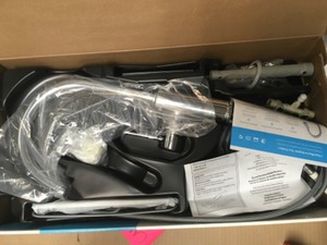 lot 38 image: Moen Sombra Single-Handle Standard Kitchen Faucet with Side Sprayer in Chrome
